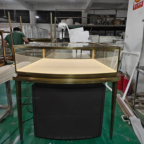 弧形组合式珠宝中岛销售柜定制 拉丝香槟金玻璃展示柜 商场珠宝店专用柜台