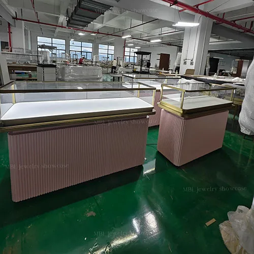 粉色竖纹珠宝销售柜台 香槟金包边玻璃LED柜 商场珠宝店接待洽谈柜